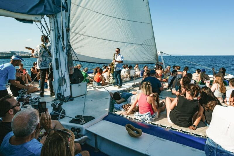 Barcelona: Sunset Catamaran Cruise With Live Music - What to Bring on Board