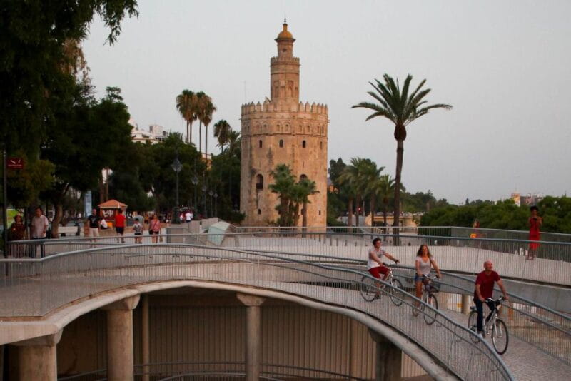 Seville: Guided Sunset Bike Tour - Guided Insights