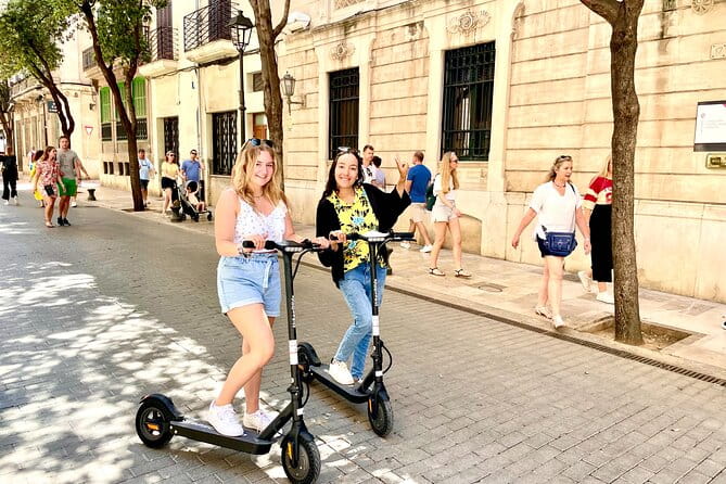 1.5 H Electric Kick-Scooter Tour - The Heart of the City: The Cathedral and Royal Palace