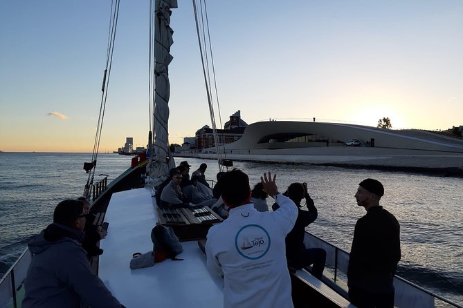 2-Hour Lisbon Traditional Boats Sunset Cruise With White Wine - Boat and Passenger Capacity