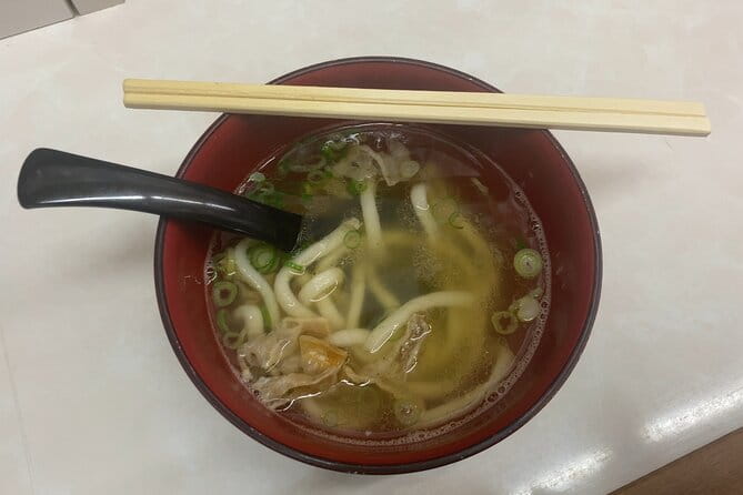 A Soul Food Tour in Osakas Shinsekai With a Local Guide - Exploring the Lively Neighborhood