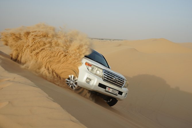 Abu Dhabi Half Day Desert Safari - Sandboarding and Sunset Exploration
