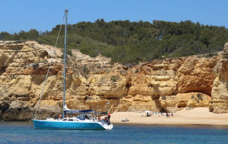 Albufeira: Sailing Boat Cruise BBQ & Open Bar on the Beach - Highlighting the Coastal Views and Cave Exteriors