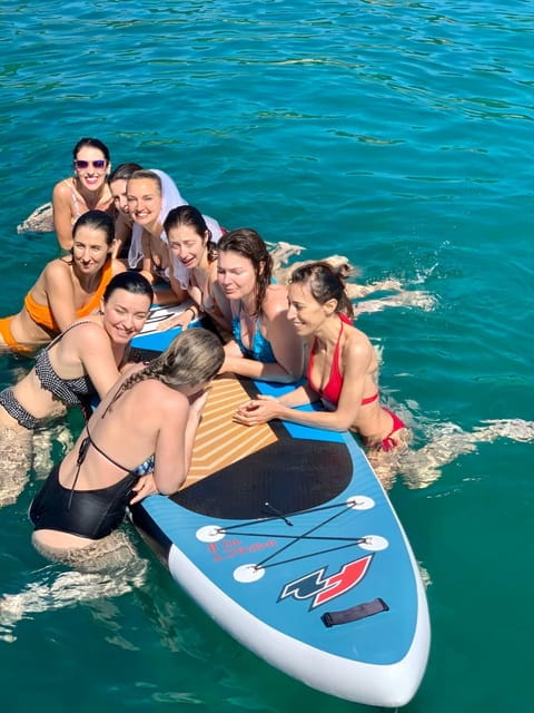 Alghero escursione in barca con pranzo giornata intera - A Full Day of Sailing, Snorkeling, and Sardinian Flavors in Alghero