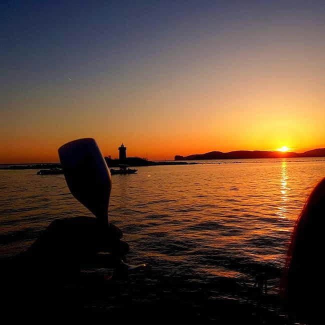Alghero: Sunset Sailing Cruise with Aperitif - Water Activities: Swim, Snorkel, and Paddleboard