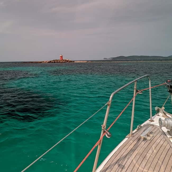 Alghero: Sunset Sailing Cruise with Aperitif - The Guide and Atmosphere