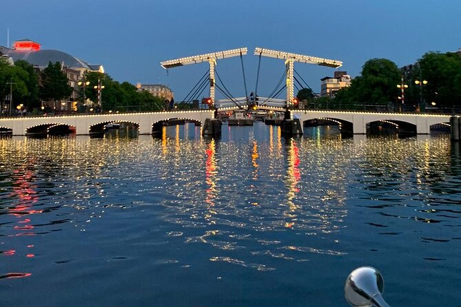 Amsterdam 1-Hour Canal Cruise With Live Guide - Duration and Schedule