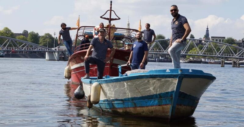Amsterdam: Canal Cruise on a Wooden Refugee Boat - Discovering a New Side of Amsterdam: An In-Depth Look at the Wooden Refugee Boat Canal Tour