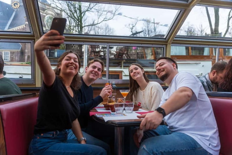 Amsterdam: Evening Cocktail Cruise Along The Canals - The Stops and Sights: A Closer Look