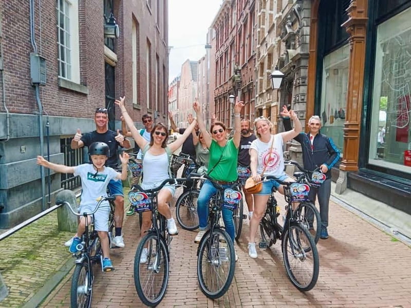 Amsterdam: Guided bike tour in French off the beaten track - Detailed Itinerary Breakdown