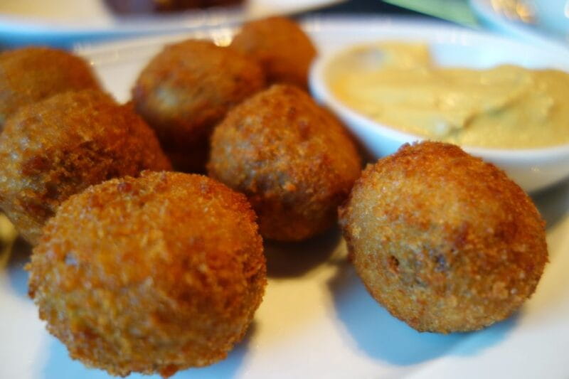 Amsterdam: Guided Cultural Food Tour in German or English - The Experience with Guides: Stories That Stick