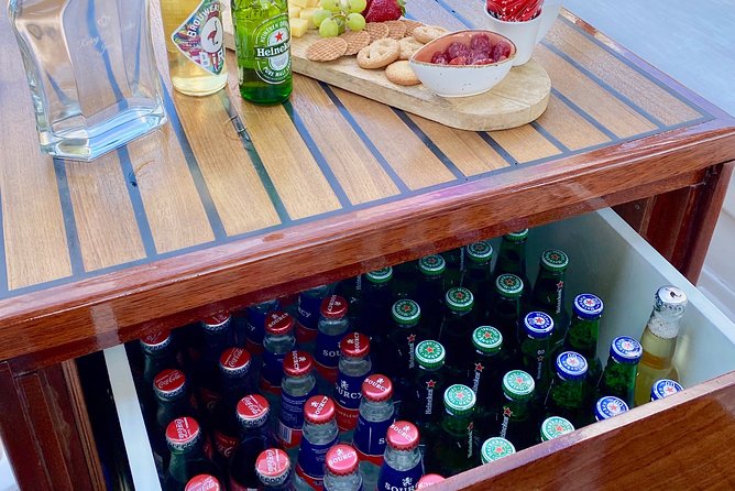 Amsterdam Small-Group Canal Cruise Including Snacks and Drinks - Booking Confirmation and Cancellation Policy