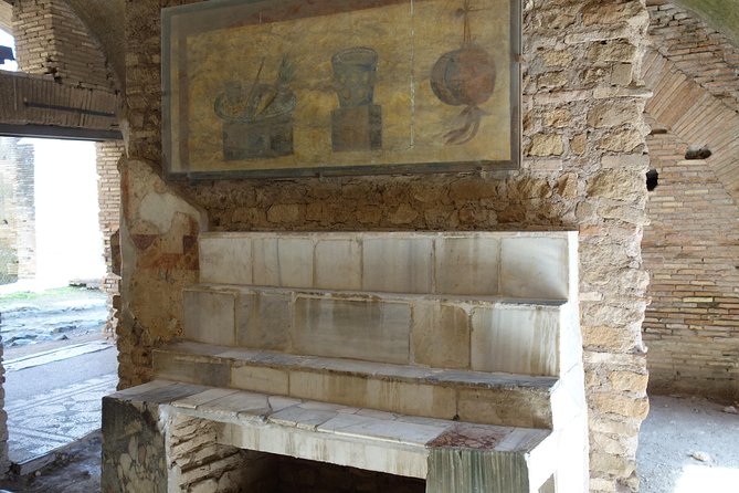 Ancient Ostia Antica Semi-Private Day Trip From Rome by Train With Guide - Walking Tour of Ancient Ruins