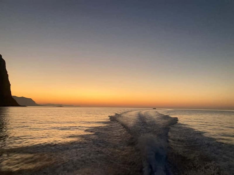 Aperitif on a boat at sunset at the Queen Cave - A Sunset Sail and Aperitif at the Queen Cave: A Review