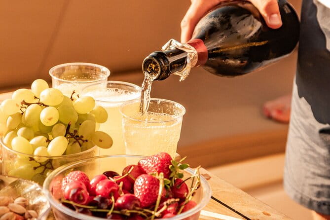 Aperitif on a boat at sunset in the Gulf of Naples - FAQ