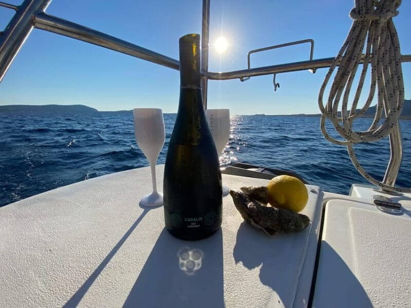 aperitifs at sunset on the Stintino catamaran burianaCharter - Key Points / Takeaways