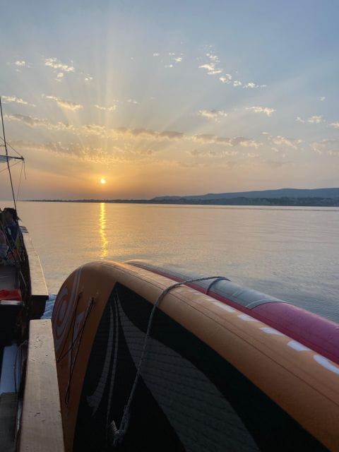 Argostoli: Sunset Cruise with Swim Stops, Dinner, and Wine - Scenic Views on the Way Back & Additional Stops in Kefalonia
