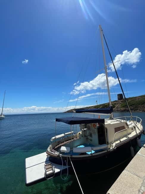 ASINARA: motorboat tour of the island park, aperitif, lunch on board. - Introduction: A Day on the Water with an Authentic Touch