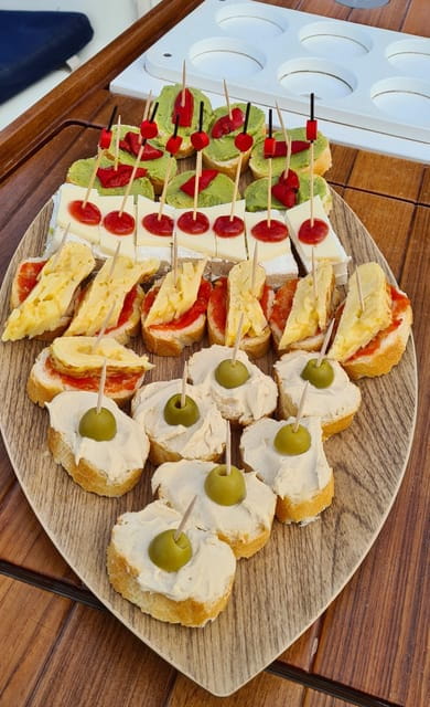 Barcelona: Sailing Tour With Spanish Tapas and Drinks - Experience Highlights