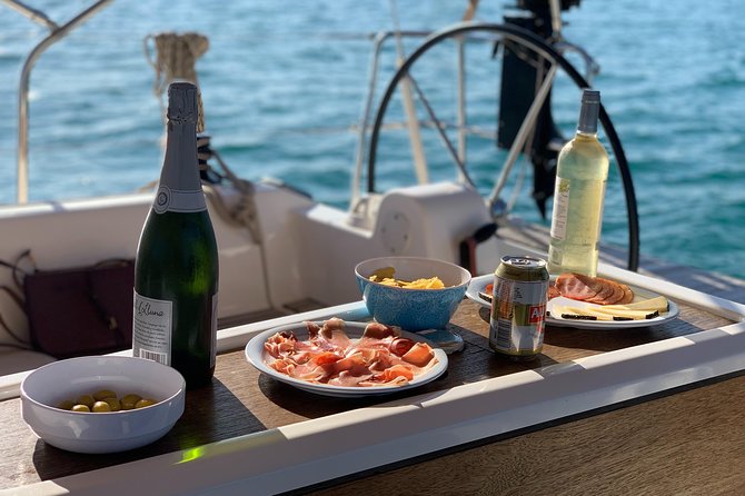 Barcelona Sunset Cruise With Light Snacks and Open Bar - Professional Skipper