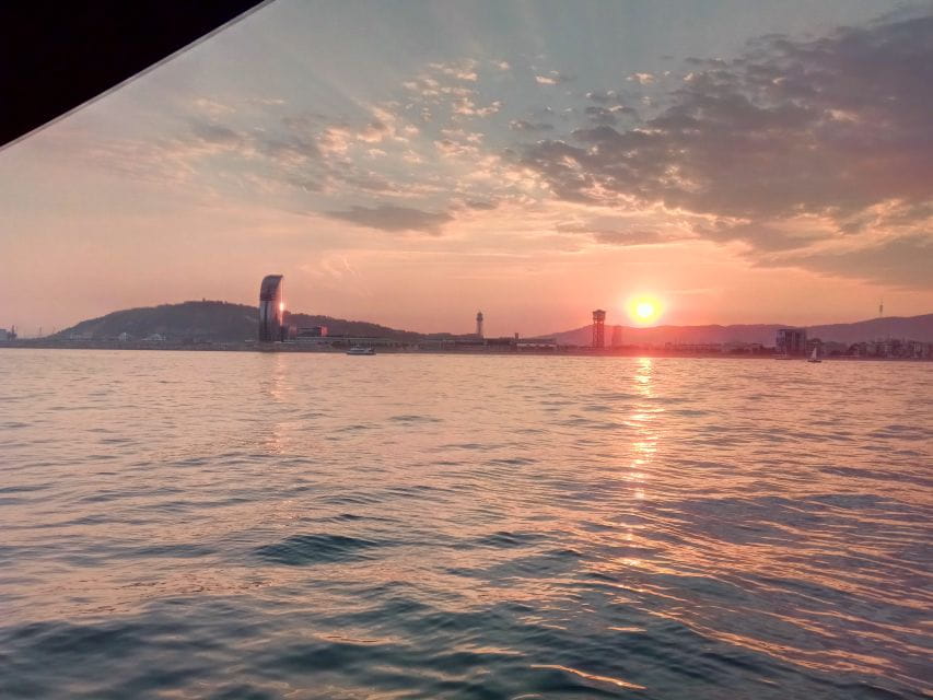 Barcelona: Sunset Sailing Tour With Open Bar & Snacks - Activities and Experiences