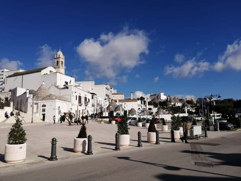 Bari: Tour Polignano Alberobello Matera (Private or Shared) - Exploring Polignano a Mare: Cliffside Charm and Gelato