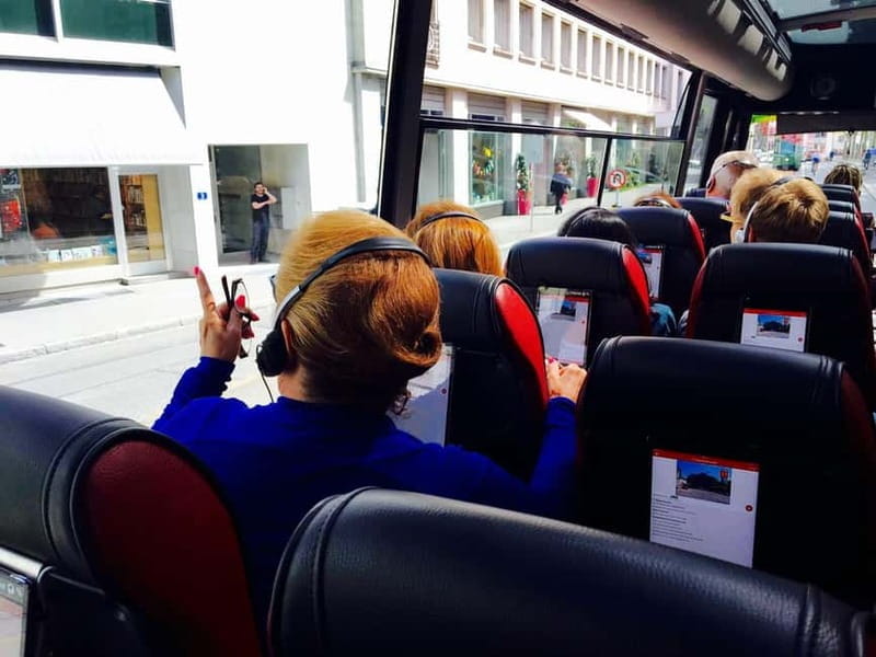 Basel: Sightseeing Bus Tour with Audio Guide - Key Points / Takeaways