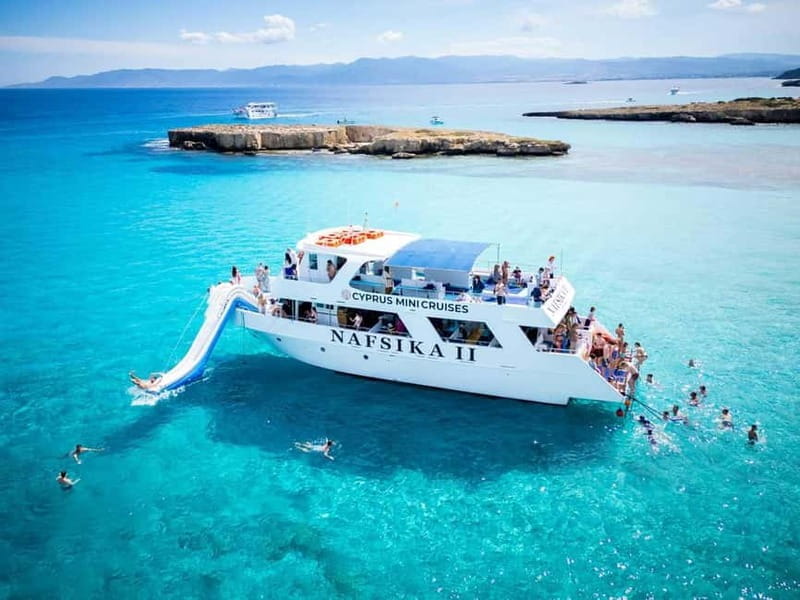 BBQ Boat: Nafsika II Sunset BBQ, Waterslide & Swimming Trip - An Authentic Coastal Cruise on the Nafsika II in Cyprus