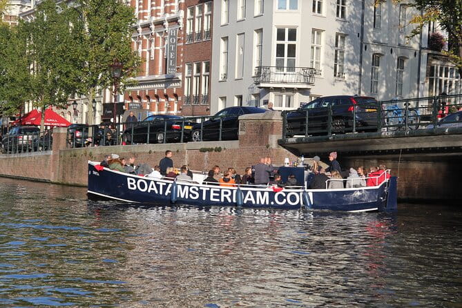 Beautiful (Open Boat) Canal Cruise in Amsterdam Open Bar included - Fun Stops and Modern Attractions