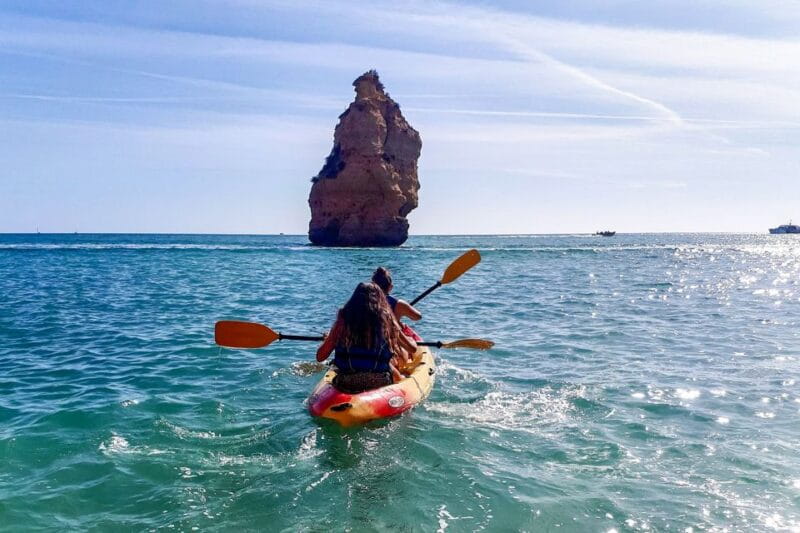Benagil: Benagil Caves and Secret Spots Guided Kayaking Tour - Visiting Praia da Marinha: A Coastal Masterpiece
