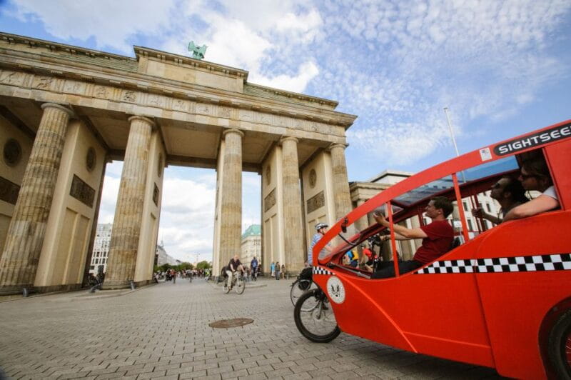 Berlin: Private E-Rickshaw Tour with Hotel Pickup Service - The Guides: Knowledge and Personality Matter