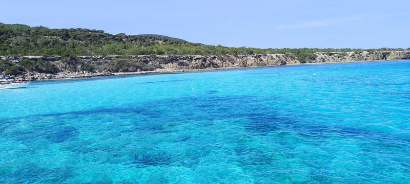 Blue Lagoon Latchi,Paphos,day trip,coach boat+waterslide. - Entering The Blue Lagoon: An Inviting Waterscape