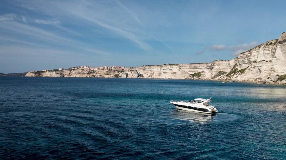 Bonifacio: Sunset Aperitif Dining Boat Tour - Paddleboarding and Snorkeling
