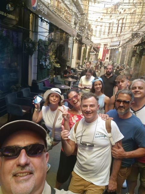 Bucharest: Walking tour with Italian speaking guide for small groups - Exploring Key Landmarks and Cultural Hotspots