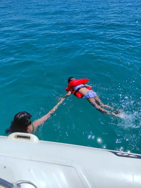 Cagliari: Full day Boat Tour; 6 Swim Stops, Sip & Snorkel - The Prosecco Toast and Relaxation