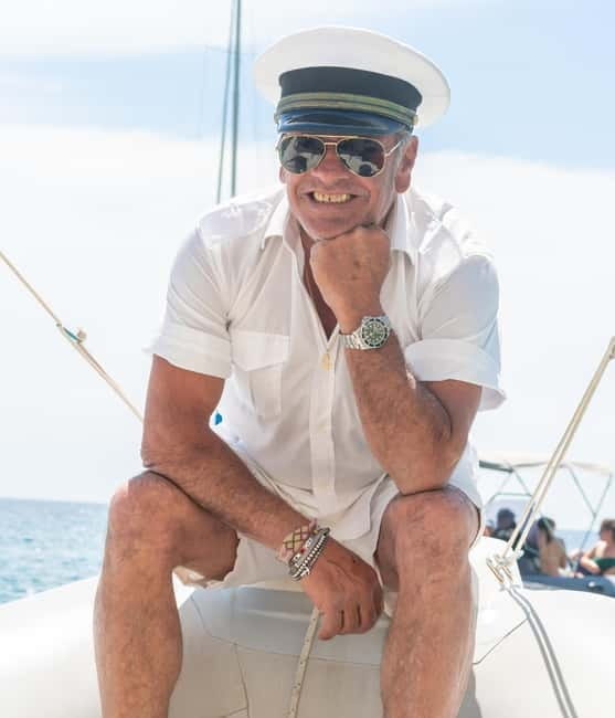 Cagliari: Sella del Diavolo Boat Tour with Drinks and Snacks - The Atmosphere: Fun, Friendly, and Authentic