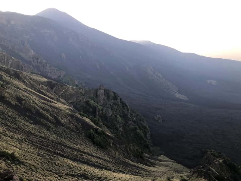 Catania: Etna Sunset Trekking with Hotel Pickup - Reaching the Volcanic Landscape: The Trek