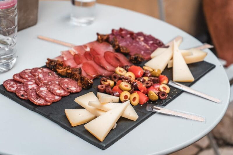 Corfu Town: Guided Walking Tour and Local Food Tastings - Visiting Iconic Landmarks and Hidden Gems