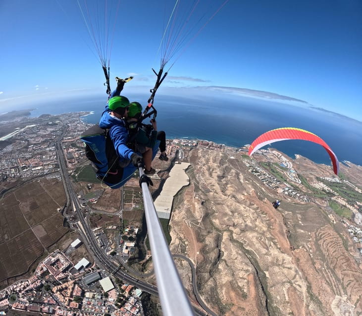 Costa Adeje: Tandem Paragliding Experience with Hotel Pickup - The Guides and Their Role