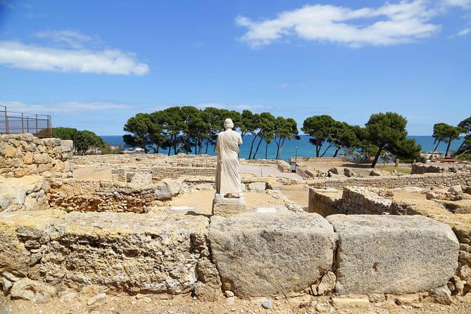 Costa Brava and Empuries Small Group Tour with Hotel Pick-Up and Boat Ride - Key Points