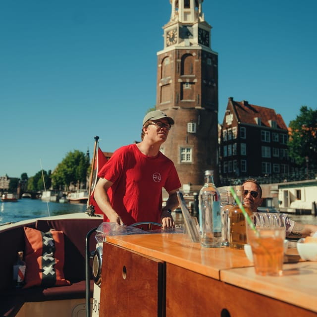 COZY AND FUN CANAL TOUR: A UNIQUE JOURNEY THROUGH AMSTERDAM - Starting Point and Ease of Access