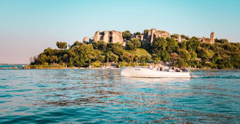 Desenzano del Garda: Sunset Boat Trip at Sunset with Drink - The Magic of Sunset Over Sirmione