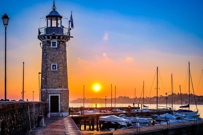 Desenzano Sunset Walking and Boat Tour with a Drink On Board - Key Points