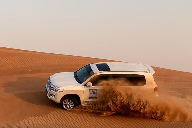 Desert Safari Morning With Camel Ride and Sand Boarding - Dune Bashing and Camel Ride