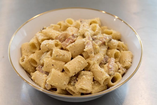 Dining experience at a local's home in Civitavecchia with show cooking - Key points / Takeaways