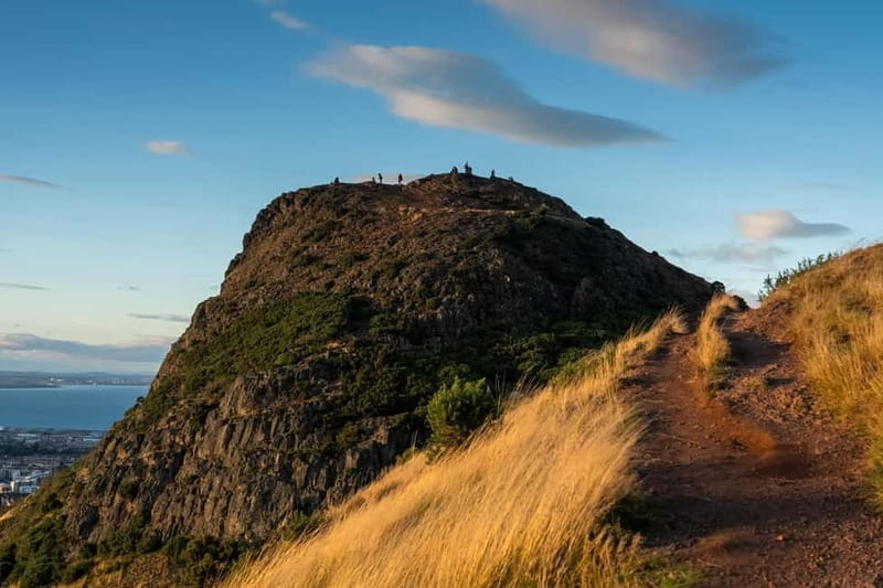 Edinburgh: Arthur's Seat Hike with Mountain Guide - Descending and Returning: A Gentle Walk Back