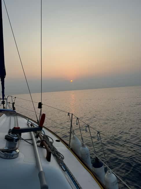 Enjoy the sunrise in Barcelona from a sailboat with drinks & snacks - The Experience and Its Charm