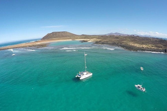 Exclusive Sailing Catamaran Experience to Lobos Island With Lunch and Drinks - Confirmation and Accessibility