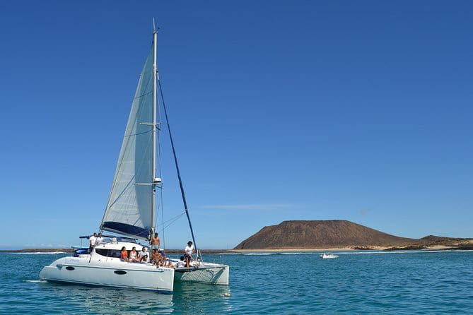 Exclusive Sailing Catamaran Experience to Lobos Island With Lunch and Drinks - Transportation and Participation