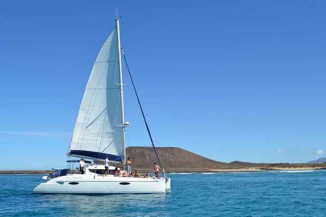 Exclusive Sailing Catamaran Experience to Lobos Island With Lunch and Drinks - Group Size and Capacity